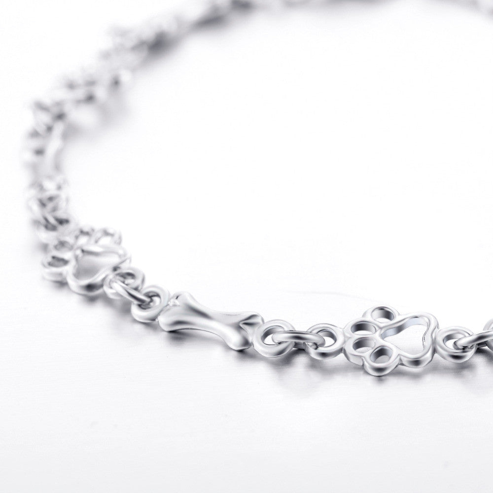 Pulsera con Patas de Perro Colgantes y Hueso de Plata Sin Tratamiento, Edición Limitada