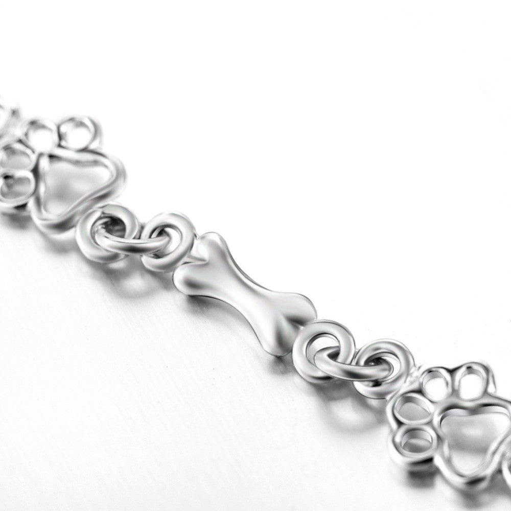 Pulsera con Patas de Perro Colgantes y Hueso de Plata Sin Tratamiento, Edición Limitada