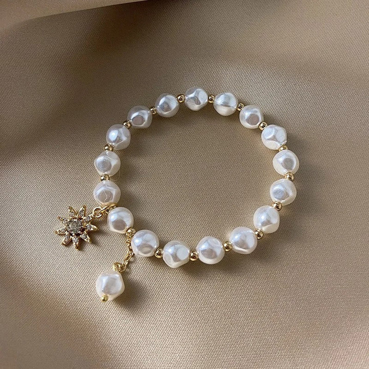 Pulsera con Medallón en Oro Blanco, Margarita y Girasol