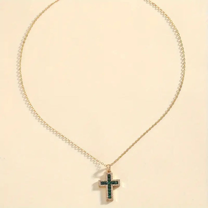 Collar de oro con cruz de esmeralda