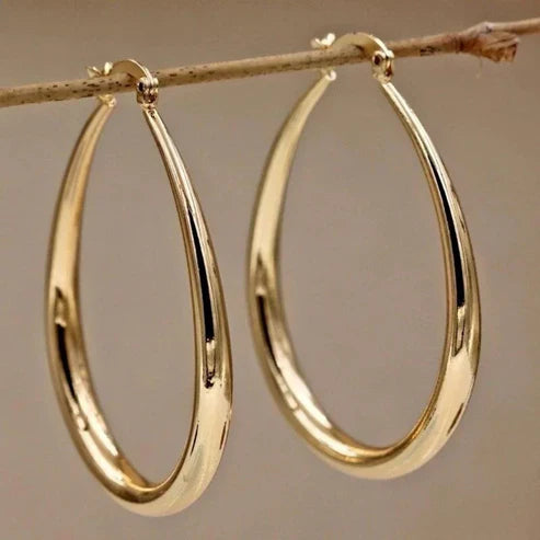 Pendientes retro dorados en forma de aro