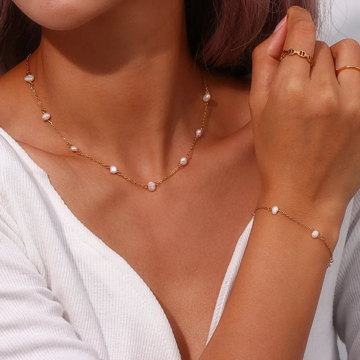 Conjunto de Collar y Pulsera con Margaritas de Acero Inoxidable