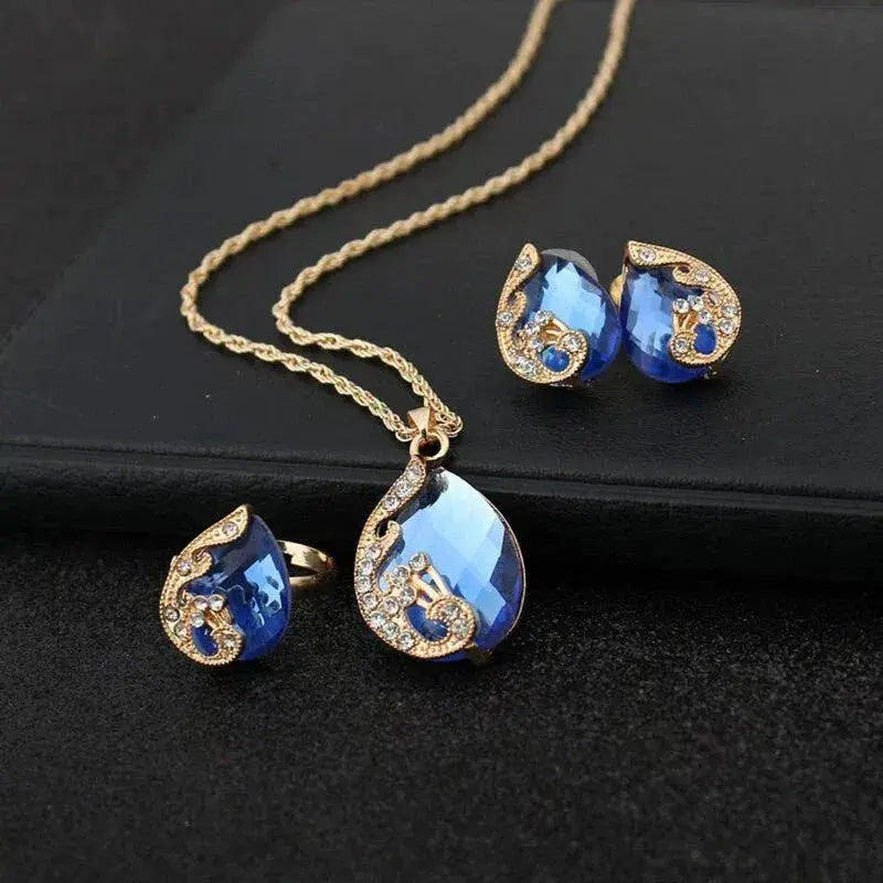 Conjunto de Collar y Pendientes en Cristal Azul con Oro